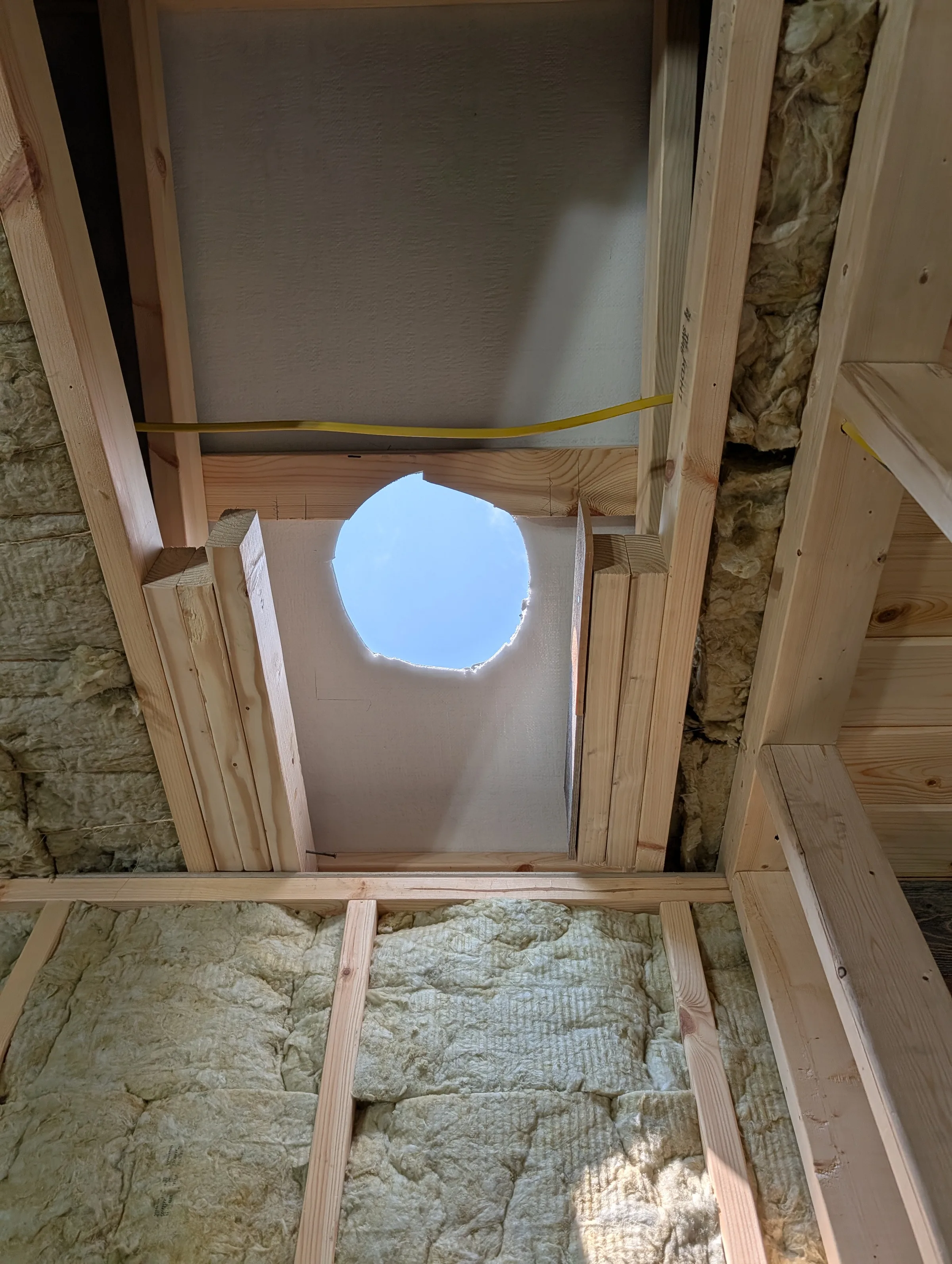 hole cut in ceiling and roof
